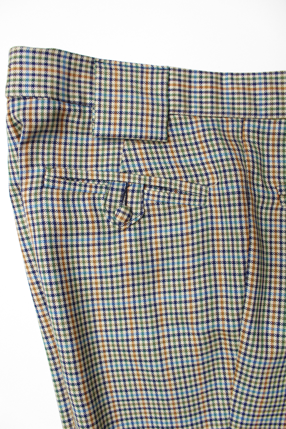 Cream w/ blue, green, gold and brown check flap pocket trousers ...